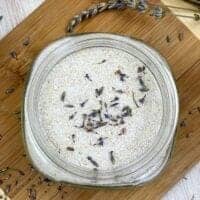 oatmeal bath soak lavender buds on wood